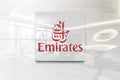 Emirates airlines on glossy office wall realistic texture